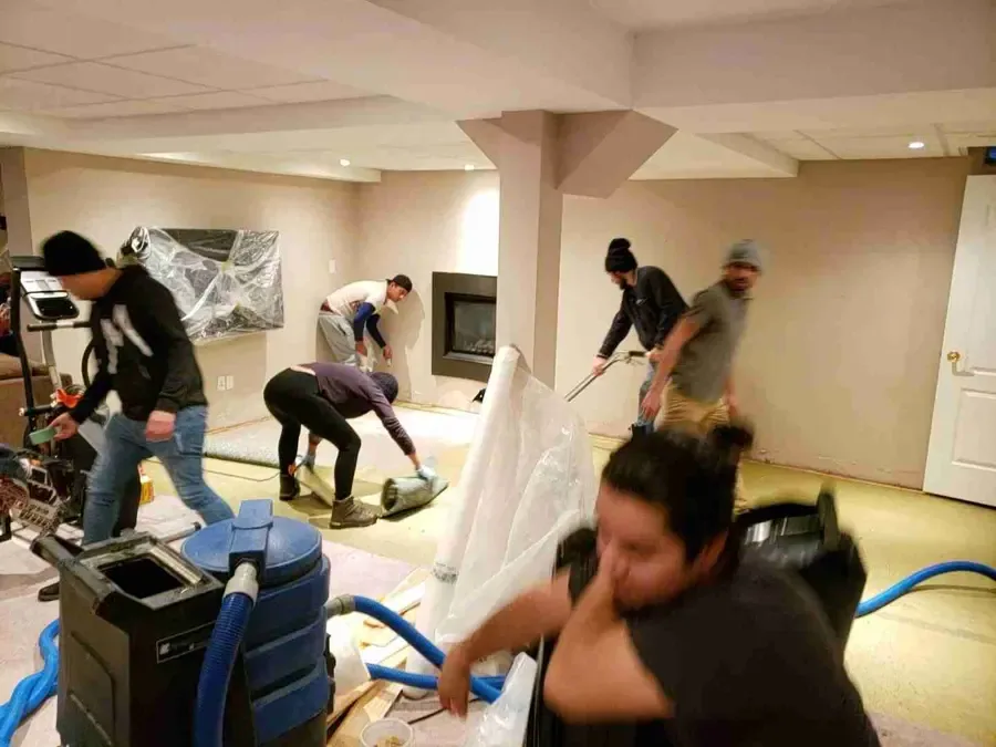 Water damage restoration work underway inside a commercial building